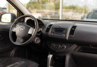 Подержанный автомобиль Nissan Note 2012 года (10 фото)