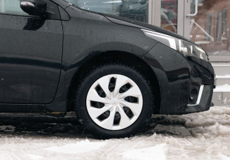 Подержанный автомобиль Toyota Corolla Sedan 2013 года (9 фото)