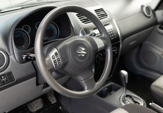 Подержанный автомобиль Suzuki SX4 Sedan 2013 года (11 фото)