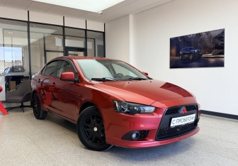Подержанный автомобиль Mitsubishi Lancer Sedan 2012 года (3 фото)