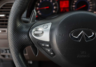 Подержанный автомобиль Infiniti FX 2010 года (12 фото)