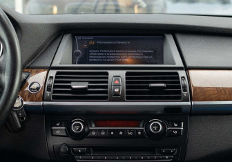 Подержанный автомобиль BMW X6 2011 года (14 фото)