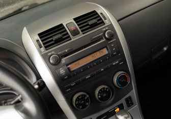 Подержанный автомобиль Toyota Corolla Sedan 2013 года (13 фото)