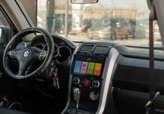 Подержанный автомобиль Suzuki Grand Vitara 2011 года (10 фото)