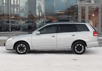 Подержанный автомобиль Nissan Wingroad 2000 года (8 фото)