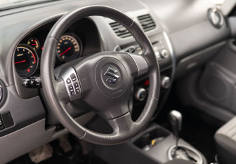 Подержанный автомобиль Suzuki SX4 Hatchback 2012 года (11 фото)