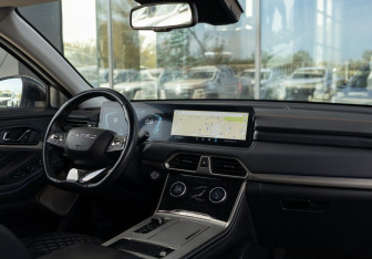 Подержанный автомобиль Exeed TXL 2022 года (10 фото)