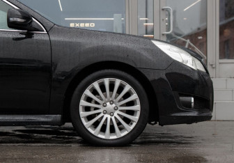 Подержанный автомобиль Subaru Legacy Sedan 2011 года (9 фото)