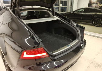 Подержанный автомобиль Audi A7 2010 года (9 фото)