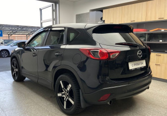 Подержанный автомобиль Mazda CX-5 2011 года (7 фото)