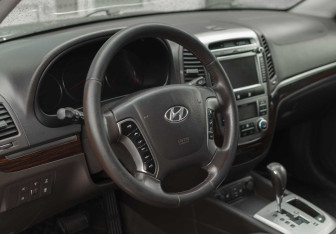 Подержанный автомобиль Hyundai Santa Fe 2012 года (11 фото)