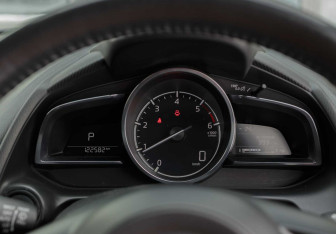 Подержанный автомобиль Mazda Demio 2016 года (13 фото)