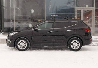Подержанный автомобиль Hyundai Santa Fe 2016 года (8 фото)