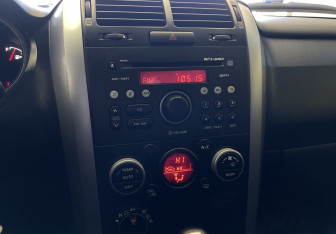 Подержанный автомобиль Suzuki Grand Vitara 2010 года (13 фото)