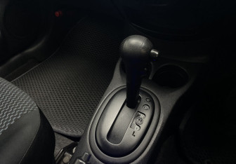 Подержанный автомобиль Nissan Note 2015 года (14 фото)