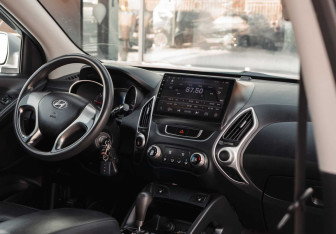 Подержанный автомобиль Hyundai Tucson 2010 года (10 фото)