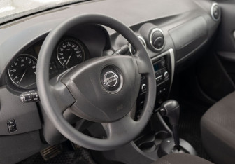 Подержанный автомобиль Nissan Almera Sedan 2014 года (11 фото)