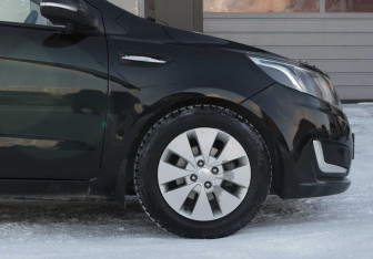 Подержанный автомобиль Kia Rio Sedan 2014 года (9 фото)