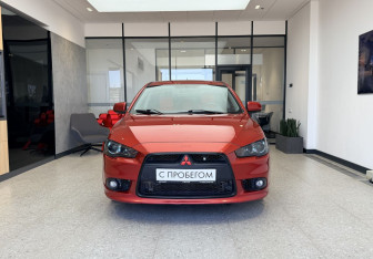 Подержанный автомобиль Mitsubishi Lancer Sedan 2012 года (2 фото)