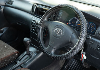 Подержанный автомобиль Toyota Allex 2003 года (11 фото)