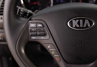 Подержанный автомобиль Kia Cerato Sedan 2013 года (12 фото)