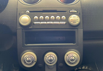 Подержанный автомобиль Mitsubishi Colt Hatchback 2007 года (12 фото)