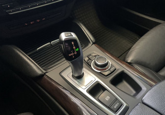Подержанный автомобиль BMW X6 2013 года (14 фото)