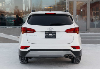 Подержанный автомобиль Hyundai Santa Fe 2016 года (6 фото)