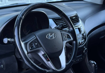 Подержанный автомобиль Hyundai Solaris Sedan 2014 года (12 фото)