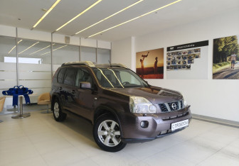 Подержанный автомобиль Nissan X-Trail 2010 года (3 фото)