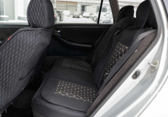 Подержанный автомобиль Toyota Corolla Wagon 2004 года (16 фото)