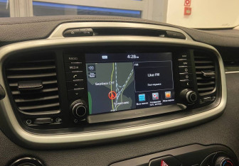 Подержанный автомобиль Kia Sorento 2016 года (10 фото)