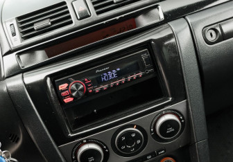 Подержанный автомобиль Mazda 3 Sedan 2007 года (14 фото)