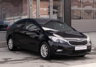 Подержанный автомобиль Kia Cerato Sedan 2013 года (3 фото)