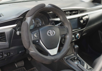 Подержанный автомобиль Toyota Corolla Sedan 2013 года (11 фото)