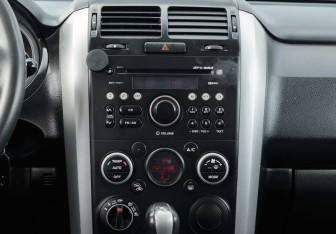 Подержанный автомобиль Suzuki Grand Vitara 2010 года (14 фото)