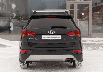 Подержанный автомобиль Hyundai Santa Fe 2016 года (6 фото)