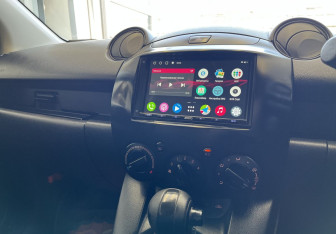 Подержанный автомобиль Mazda Demio 2007 года (12 фото)