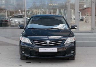Подержанный автомобиль Toyota Corolla Sedan 2013 года (2 фото)