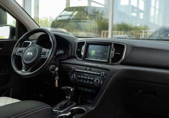 Подержанный автомобиль Kia Sportage 2016 года (10 фото)