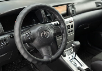 Подержанный автомобиль Toyota Corolla Sedan 2005 года (11 фото)