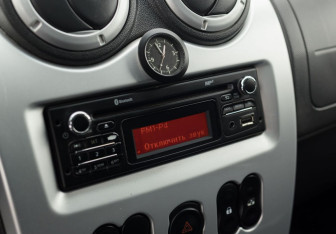 Подержанный автомобиль Renault Sandero 2013 года (13 фото)