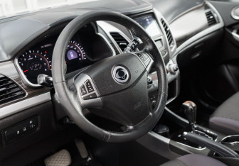 Подержанный автомобиль SsangYong Actyon 2014 года (11 фото)