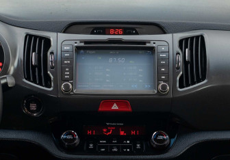 Подержанный автомобиль Kia Sportage 2011 года (14 фото)