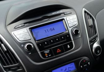 Подержанный автомобиль Hyundai ix35 2012 года (14 фото)