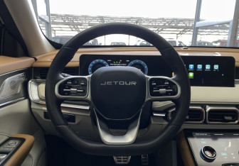 Подержанный автомобиль Jetour X70 2023 года (11 фото)