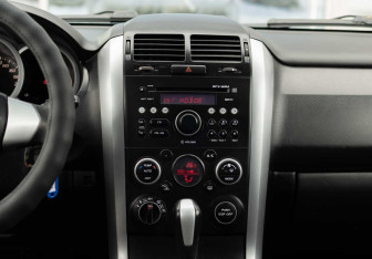 Подержанный автомобиль Suzuki Grand Vitara 2010 года (14 фото)