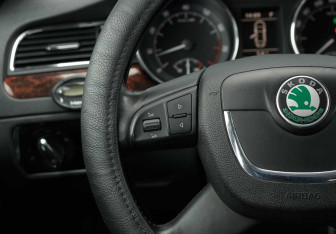 Подержанный автомобиль Skoda Superb Wagon 2012 года (12 фото)