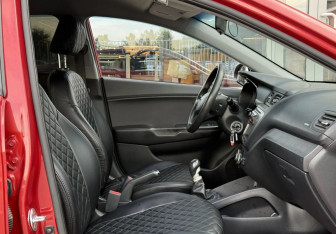 Подержанный автомобиль Kia Rio Sedan 2015 года (17 фото)