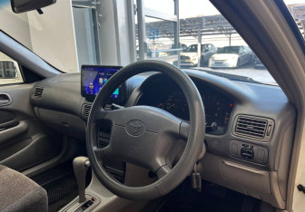 Подержанный автомобиль Toyota Sprinter Sedan 1998 года (9 фото)